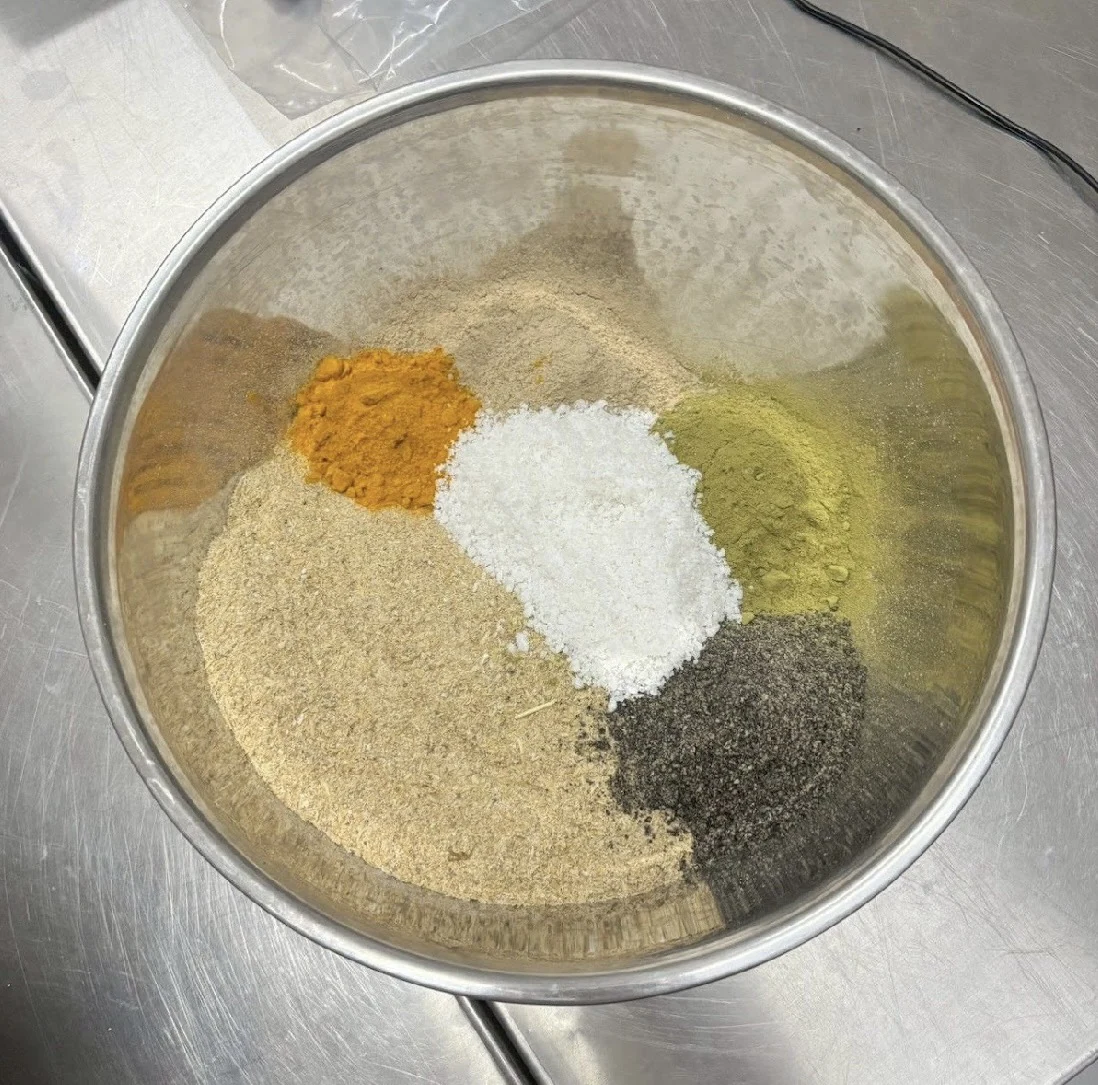 Dry ingredients arranged separately in a mixing bowl