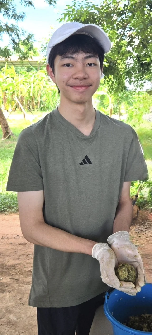 A participant holding a prepared supplement ball
