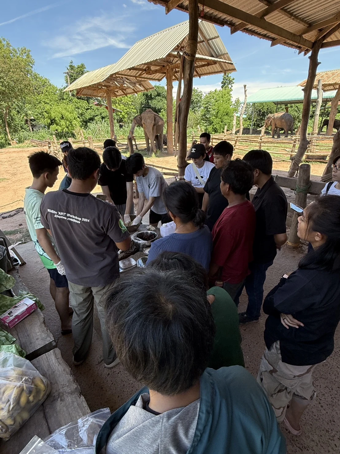 Participants gathered around a table during the preparation activity